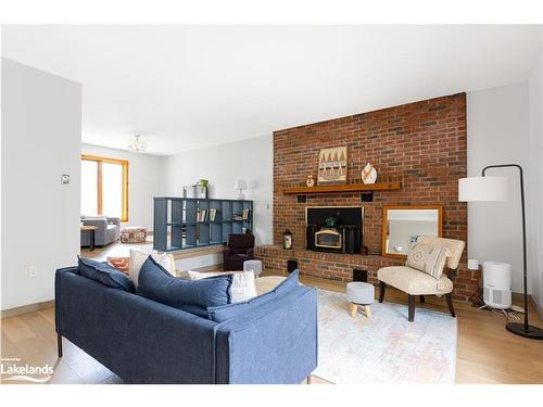 1001 Hemlock Road, Huntsville, ON - Indoor Photo Showing Living Room With Fireplace