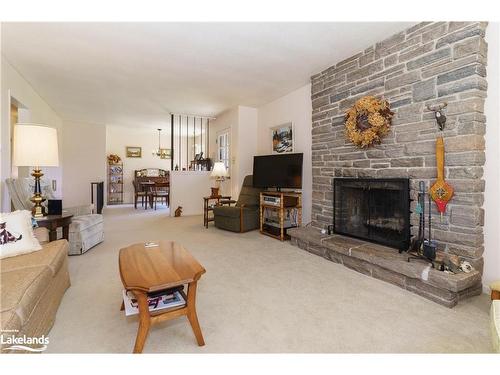 56 Hanes Road, Huntsville, ON - Indoor Photo Showing Living Room With Fireplace