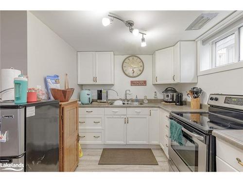 31 Courtice Crescent, Collingwood, ON - Indoor Photo Showing Kitchen With Double Sink