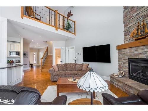 117 Earl Street, Wasaga Beach, ON - Indoor Photo Showing Living Room With Fireplace