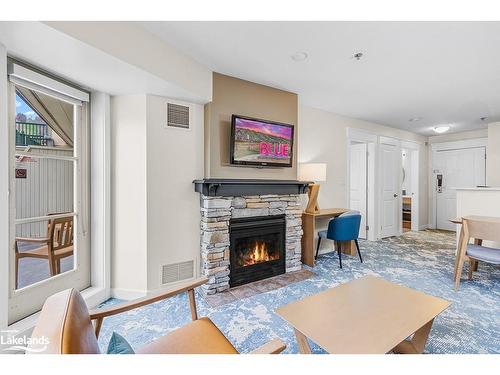 324-170 Jozo Weider Boulevard, The Blue Mountains, ON - Indoor Photo Showing Living Room With Fireplace