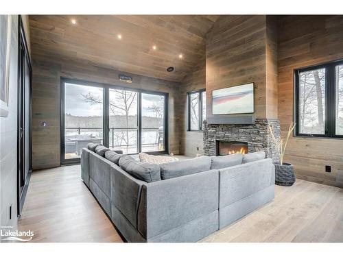 151 124 Highway, Mcdougall, ON - Indoor Photo Showing Living Room With Fireplace
