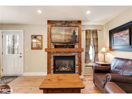 105-10-1052 Rat Bay Road, Lake Of Bays (Twp), ON - Indoor Photo Showing Living Room With Fireplace