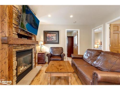 105-10-1052 Rat Bay Road, Lake Of Bays (Twp), ON - Indoor Photo Showing Living Room With Fireplace