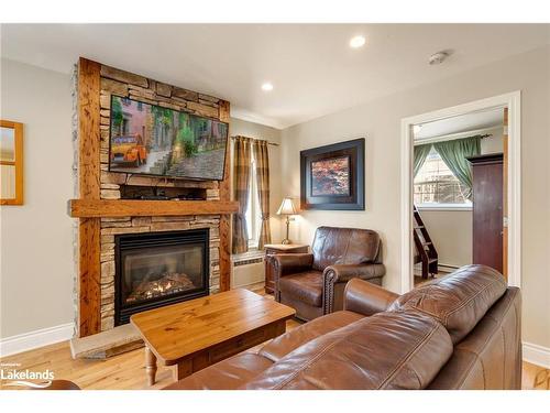 105-10-1052 Rat Bay Road, Lake Of Bays (Twp), ON - Indoor Photo Showing Living Room With Fireplace