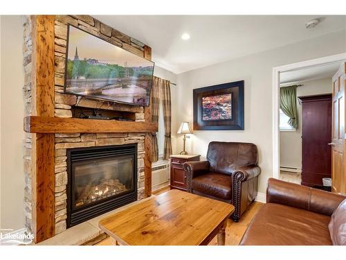 105-10-1052 Rat Bay Road, Lake Of Bays (Twp), ON - Indoor Photo Showing Living Room With Fireplace