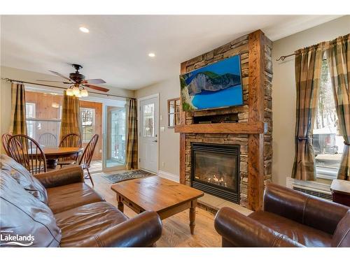 105-10-1052 Rat Bay Road, Lake Of Bays (Twp), ON - Indoor Photo Showing Living Room With Fireplace