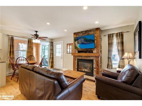 105-10-1052 Rat Bay Road, Lake Of Bays (Twp), ON - Indoor Photo Showing Living Room With Fireplace