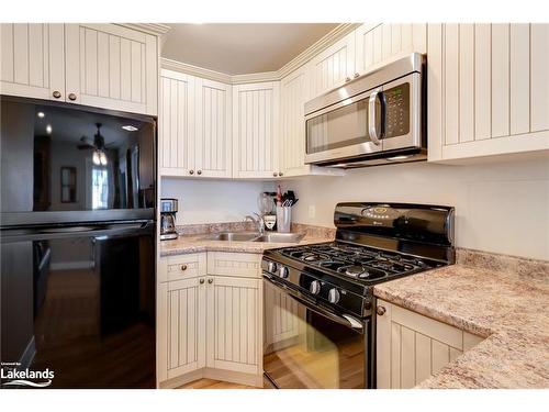 105-10-1052 Rat Bay Road, Lake Of Bays (Twp), ON - Indoor Photo Showing Kitchen With Double Sink