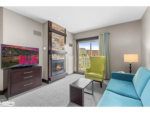 422-190 Jozo Weider Boulevard, The Blue Mountains, ON - Indoor Photo Showing Living Room With Fireplace