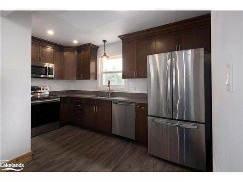 210 Arlberg Crescent, The Blue Mountains, ON - Indoor Photo Showing Kitchen With Double Sink