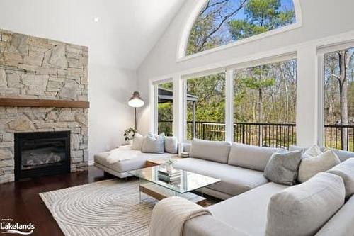 1078 Buckeye Road, Muskoka Lakes, ON - Indoor Photo Showing Living Room With Fireplace