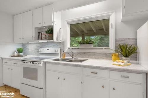 77 Woods Road, Carling, ON - Indoor Photo Showing Kitchen With Double Sink