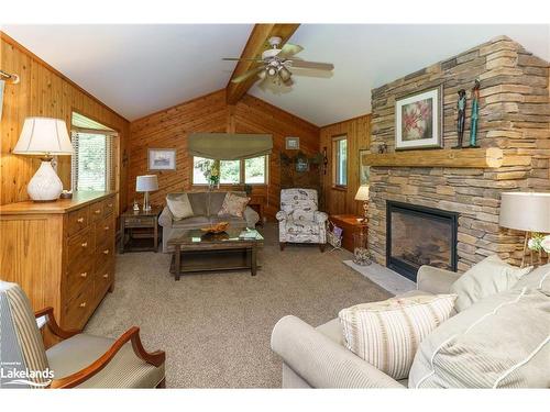 1139 High Falls Road, Bracebridge, ON - Indoor Photo Showing Living Room With Fireplace