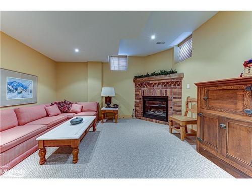 120 Venture Boulevard, The Blue Mountains, ON - Indoor Photo Showing Basement With Fireplace