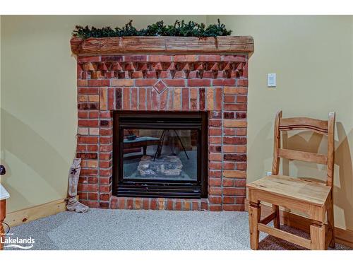 120 Venture Boulevard, The Blue Mountains, ON - Indoor Photo Showing Living Room With Fireplace