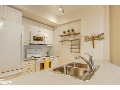 314-280 Aberdeen Boulevard, Midland, ON - Indoor Photo Showing Kitchen With Double Sink