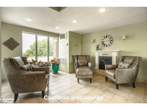 314-280 Aberdeen Boulevard, Midland, ON - Indoor Photo Showing Living Room With Fireplace