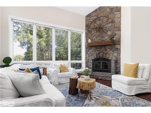 337 Pine Ridge Road, Huntsville, ON - Indoor Photo Showing Living Room With Fireplace