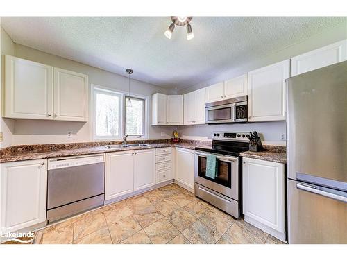 19 Caribbean Drive, Wasaga Beach, ON - Indoor Photo Showing Kitchen With Stainless Steel Kitchen With Double Sink
