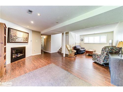 19 Caribbean Drive, Wasaga Beach, ON - Indoor Photo Showing Living Room With Fireplace
