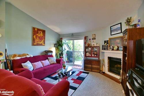 171 Escarpment Crescent, Collingwood, ON - Indoor Photo Showing Living Room With Fireplace