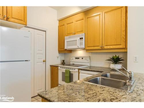 102-280 Aberdeen Boulevard, Midland, ON - Indoor Photo Showing Kitchen With Double Sink