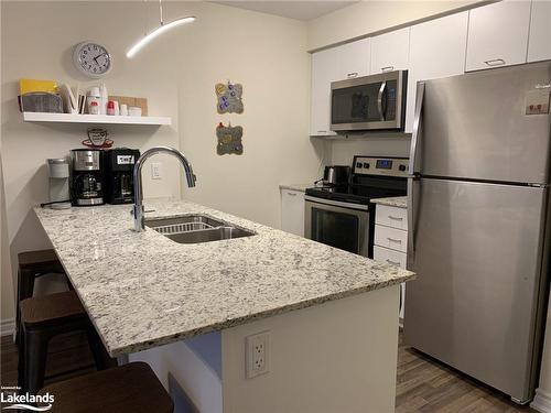 102-4 Cove Court, Collingwood, ON - Indoor Photo Showing Kitchen With Stainless Steel Kitchen With Double Sink With Upgraded Kitchen