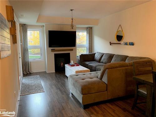 102-4 Cove Court, Collingwood, ON - Indoor Photo Showing Living Room With Fireplace