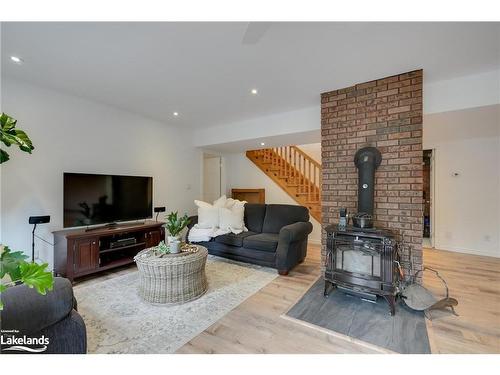 1107 Waseosa Lake Rd, Huntsville, ON - Indoor Photo Showing Living Room With Fireplace