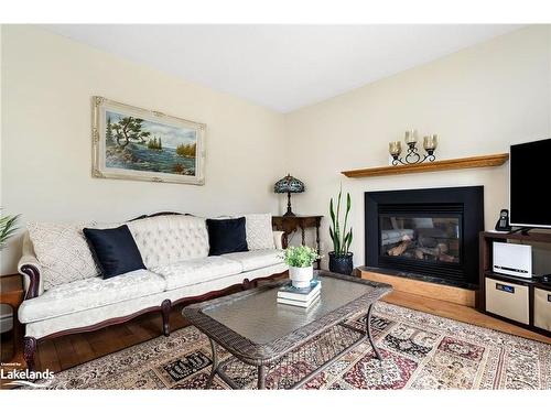 42 Winnifred Avenue, Parry Sound, ON - Indoor Photo Showing Living Room With Fireplace