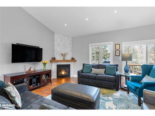 32 Pinecone Avenue, Tiny, ON - Indoor Photo Showing Living Room With Fireplace