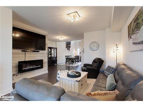 7 Nautical Lane, Wasaga Beach, ON - Indoor Photo Showing Living Room With Fireplace