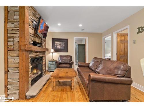 102-9-1052 Rat Bay Road, Lake Of Bays (Twp), ON - Indoor Photo Showing Living Room With Fireplace