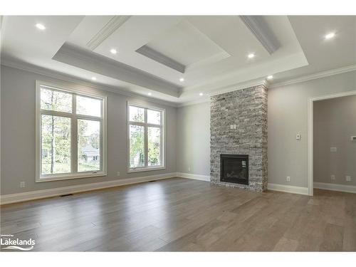 27 Albion Lane, Tiny, ON - Indoor Photo Showing Living Room With Fireplace