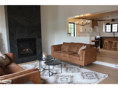 204 Wurm Road, Magnetawan, ON - Indoor Photo Showing Living Room With Fireplace