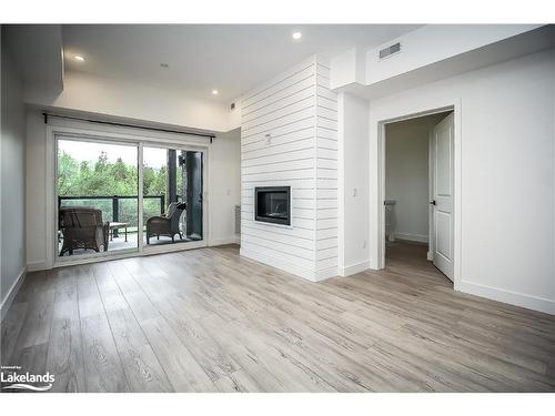 105-16 Beckwith Lane, The Blue Mountains, ON - Indoor Photo Showing Other Room With Fireplace