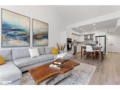 302-3 Tree Tops Lane, Huntsville, ON - Indoor Photo Showing Living Room