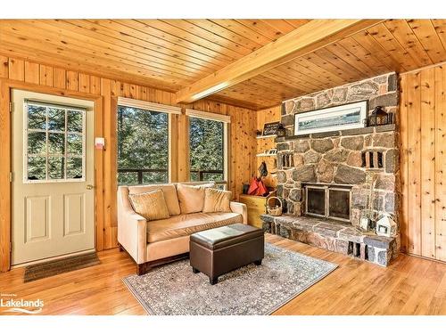 13080 Hemlock Island, Haliburton, ON - Indoor Photo Showing Living Room With Fireplace