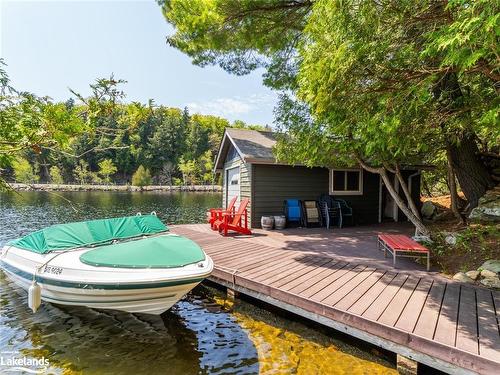 1243 Port Cunnington Road, Dwight, ON - Outdoor With Body Of Water With Deck Patio Veranda