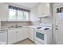 35-37 William Street, Orillia, ON  - Indoor Photo Showing Kitchen With Double Sink 