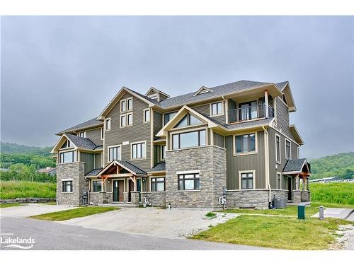 7-106 Alpine Springs Court, The Blue Mountains, ON - Outdoor With Facade