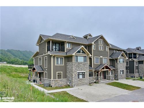 7-106 Alpine Springs Court, The Blue Mountains, ON - Outdoor With Facade