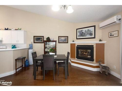 11-83 Victoria Street, Meaford, ON - Indoor Photo Showing Dining Room With Fireplace