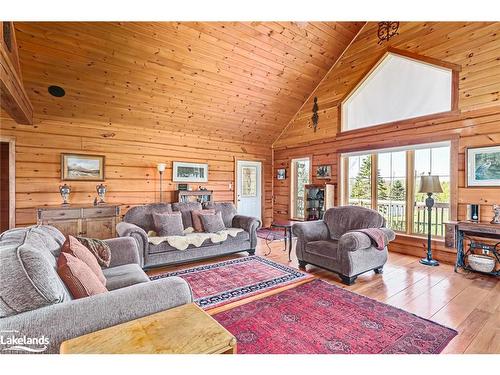 545413 4A Sideroad, Markdale, ON - Indoor Photo Showing Living Room With Fireplace