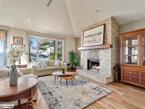 9 Monica Road, Tiny, ON - Indoor Photo Showing Living Room With Fireplace