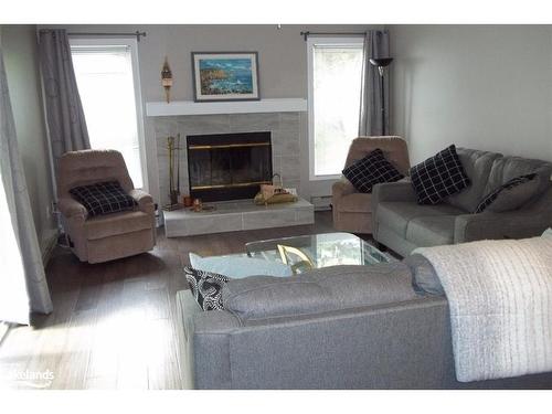 387 Mariners Way, Collingwood, ON - Indoor Photo Showing Living Room With Fireplace