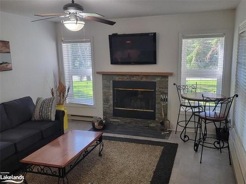 395 Mariners Way, Collingwood, ON - Indoor Photo Showing Living Room With Fireplace