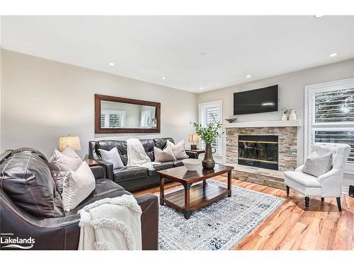 402 Mariners Way, Collingwood, ON - Indoor Photo Showing Living Room With Fireplace