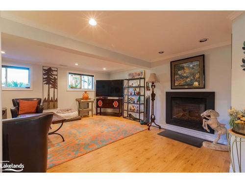 11 Meadow Park Drive, Huntsville, ON - Indoor Photo Showing Living Room With Fireplace